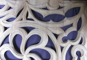 Abstract design of loaves and fishes, wood carved gothic tracery, Saint Philip Presbyterian Church, Houston TX